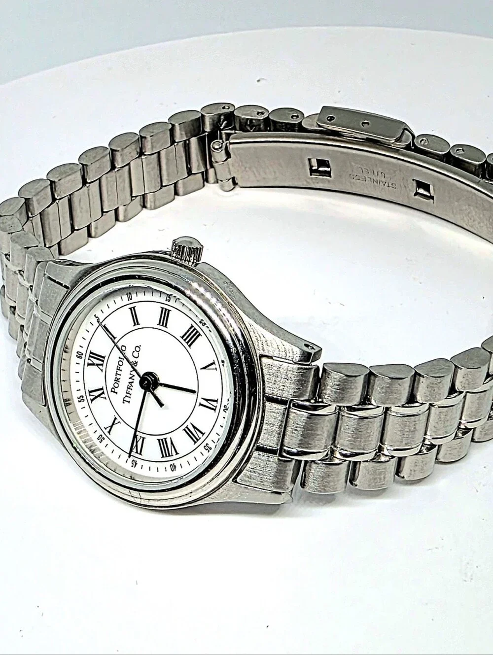 Tiffany & Co. Portfolio Stainless Steel Quartz Watch (Pre-loved) with its origin